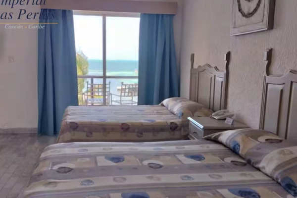 Interior de habitación remodelada en Imperial Las Perlas